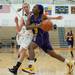 Ypsilanti's Jasmine Jones tries to dribble past Dexter's Riley McDonald during their game, Friday Jan. 11.
Courtney Sacco I AnnArbor.com 